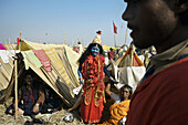 Woman as Durga goddess, Sagar Mela, India, Ganges River