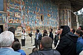 Romania,Moldavia Region,Southern Bucovina,Voronets Monastery,Church of St  George,pilgrims,Frescos,wall paintings,biblical scenes
