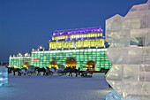 China. Heilongjiang. HAERBIN  Harbin): Haerbin Ice and Snow World Festival. All Buildings built of ice. Entrance Gate and Horse Drawn Carriages