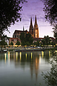Dom St. Peter cathedral and town in the evening, Regensburg, Bavaria, Germany