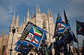 Italy, Lombardy, Milan, Piazza Duomo, Duomo cathedral and soccer team flags