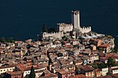 Italy, Veneto, Lake District, Lake Garda, Malcesine, aerial town view and Castello Scaligero castle from Monte Baldo