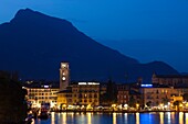 Italy, Trentino-Alto Adige, Lake District, Lake Garda, Riva del Garda, town view with Torre Apponale, 13th century tower, evening