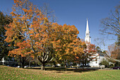 The Battle Green historic town green with church, maples in autumn, Lexington, Massachusetts, USA