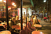 Cafe on Boulevard Saint-Germain in the evening, Saint-Germain-des-Pres, Paris, France