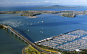 Auckland Harbour Bridge with Westhaven Marina Devonport and Rangitoto Island New Zealand