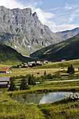 Hamlet Radons, valley Val Nandro, Piz Forbesch and Wissberg in background, Kanton of Grisons, Switzerland