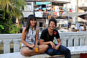 Young couple on a bench, Bangkok, Thailand, Thailand, Asia