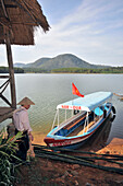 Ferry boat at a lake near Da Lat in the southern mountains, Vietnam