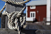 A rope with a knot around a post at Norrfällsviken, Höga Kusten, Sweden., Sweden, Europe