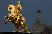 Der goldene Reiter, The golden equestrian sculpture of King Augustus the Strong, August II, dome of the Frauenkirche, Church of our Lady in the background, Dresden, Saxony, Germany