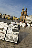 Artwork for sale on Main Market Square Rynek Glowny in front of St. Mary's Basilica Kosciól Mariacki, Krakow, Poland, Europe