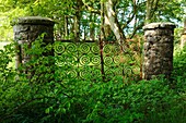 Old wrought iron estate gates at Ballylough House, near Bushmills, County Antrim, Northern Ireland