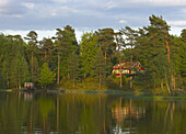 Red house near lake