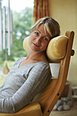 Woman relaxing in chair