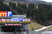 Parking deck and skiing area with artificial snow in the background, Zillertal skiing area, Zillertal valley, Tyrol, Austria