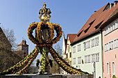 Fountain with Easter decorations, Rothenburg ob der Tauber, Bavaria, Germany
