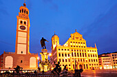 Square with illuminated city hall, night shot, Augsburg, Bavaria, Germany