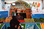 Local people at a fruit and vegetable stand at the zouk, Abu Simbel, Egypt, Africa