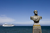 Statue at seaside promenade and cruiseship Insignia (Oceania Cruises), Puerto Montt, Los Lagos, Patagonia, Chile, South America, America