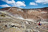 Hiker at the vulcono crater, Vulcano Island, Aeolian islands, Sicily, Italy