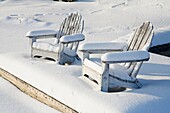 chairs in snow