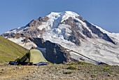 Alpine camp on Chowder Ridge with Mount Baker elevation 10,778 feet 3,285 m in the distance  Mount Baker Wilderness Washington USA