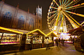 Opera Palace Christmas market and Friedrich Werdersche Church in background, Berlin, Germany