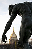 Rodin´s work displayed in the garden of Rodin Museum with the golden dome of Invalides in background, Paris. France