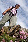 Woman practice mountaineering in the Ándara massif, of walking next to the Picos de Europa National Park  Oceño  Asturias  Spain