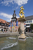 Marktbrunnen fountain of Heiliger Georg on Markplatz square and Rathaus city hall, Eisenach, Thuringia, Germany, Europe