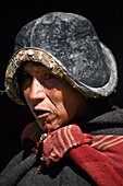 Bolivia, Tarabuco, Old indian woman wearing the leather ´montera´ copied after the iron helmet of the spanish conquistadores