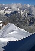 Hikers up Aiguille du Midi  Mont-Blanc  French Alps
