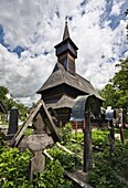 Wooden Church in Ieud Biserica de Lemn din Deal, Nasterea Maicii Domnului, Maramures, Romania is listed as UNESCO World heritage  Built in 1364 the church is the oldest wooden church in Maramures and shows the traditionall crafts of the carpenters in Mara