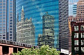 Reflections in windows of modern office building