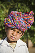 Young Indian boy wearing a colourful turban, Jodhpur, Rajasthan, India