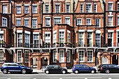 Victorian houses in red brick, Pont street, Kensington, London, England, United Kingdom