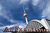 Alexanderplatz station sign and the TV Tower, Berlin, Germany