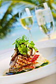 Hawaii. Baked Sea Bass at the Halekulanai Hotel. Waikiki Beach