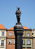 Man with sword statue on whipping post, Old Market Square, Poznan, Poland