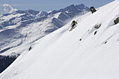 Downhill skiing in deep snow, Disentis, Oberalp pass, Canton of Grisons, Switzerland