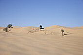 Toyota Landcruiser driving down dune, Chott El Jerid, Tunesia, Africa