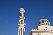 minaret and dome of mosque in the city of Muscat, Sultanate of Oman, Arab country, Asia.