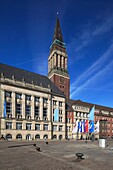 Germany, Kiel, Kiel Fjord, Baltic Sea, Schleswig-Holstein, city hall, city hall tower, campanile, brick building, Rathaus Square, flags