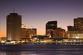 USA, Louisiana, New Orleans, city skyline from Algiers, Mississippi River, evening