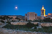 Malta, Gozo Island, Victoria-Rabat, Il-Kastell fortress, tower of Cathedral of the Assumption and moonrise