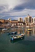 Malta, Valletta, St Julian's, cafes and buildings of the Spinola Bay area