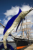 Harborside Marlin sculpture and Star of India, built 1863, world's oldest ship maintaining a regular sailing schedule, Maritime Museum, San Diego, California, USA