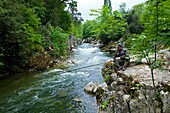 Atlantic salmon fishermen, Puenteviesgo, Pas River, Cantabria, Spain