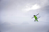 Male free skier ascending in deep snow, Mayrhofen, Ziller Valley, Tyrol, Austria